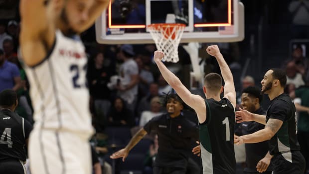 Wagner celebrates a win over Howard in the 2024 First Four.